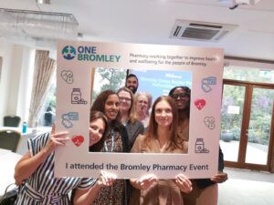 Organisers from the Bromley Cross Sector Pharmacy Networking Event inside a giant photo frame